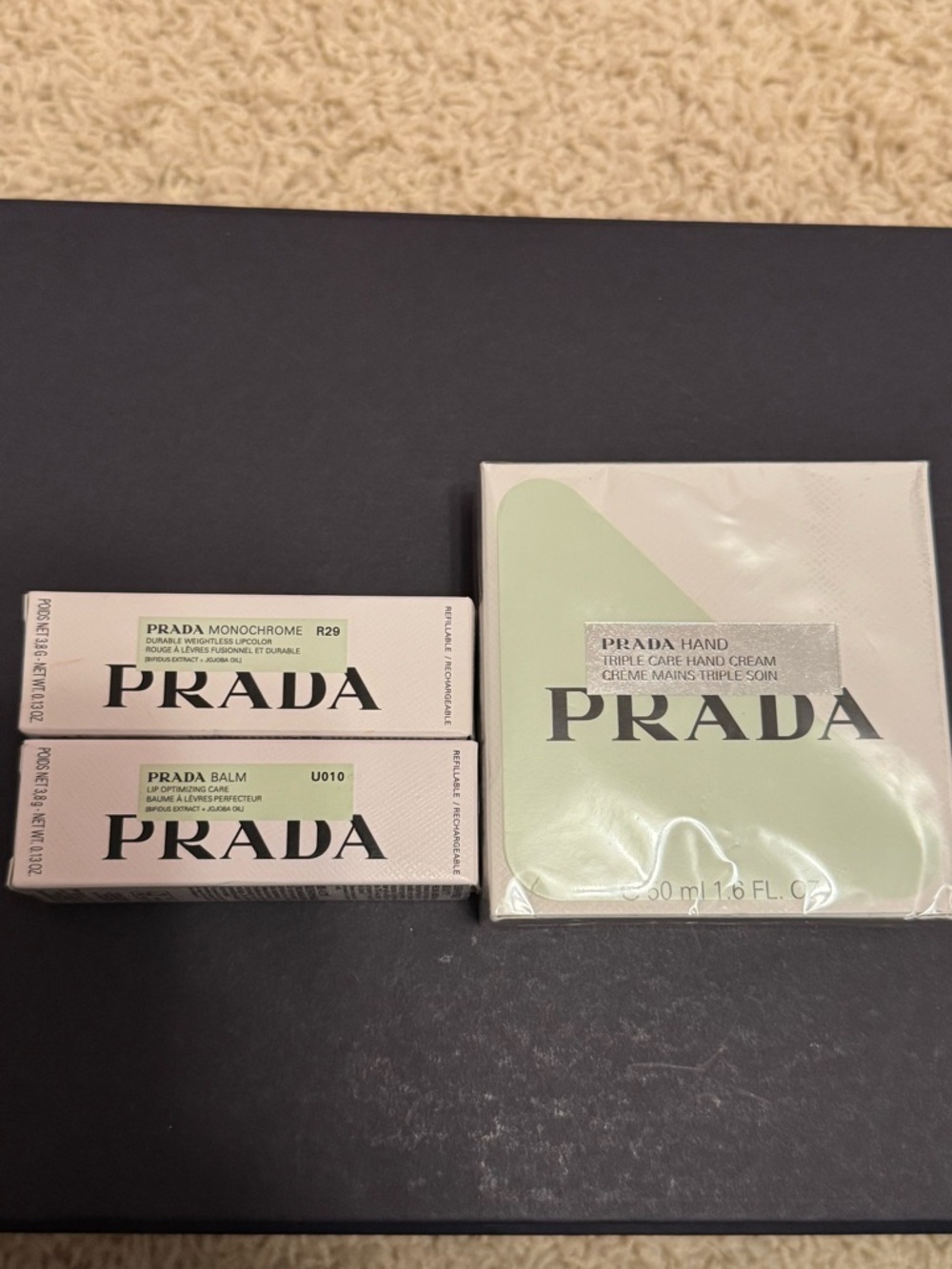 Prada BUNDLE! 1 Prada lipstick, 1 Prada lip balm, and 1 Prada hand cream